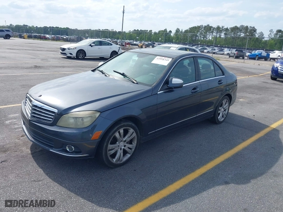 2008 Mercedes-Benz C-Class 3.0L Sport with VIN WDDGF54X48F052635, listed as a IAAI auction lot 42098349 with 256,289 mi miles. Bid and sale history available at carsss.com. Image 2.