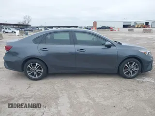2022 Kia Forte LXS z VIN 3KPF24AD6NE440364, wystawiony jako IAAI lot #41581237 z przebiegiem 52 553 mil mil oraz . Historia ofert i sprzedaży dostępna na DreamBid. Obrazek 13.