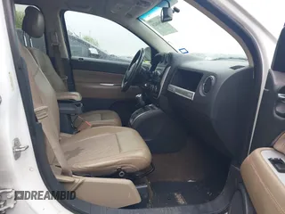 2014 Jeep Compass High Altitude with VIN 1C4NJCEAXED715454, listed as a IAAI auction lot 41960428 with 117,023 mi miles. Bid and sale history available at carsss.com. Image 5.
