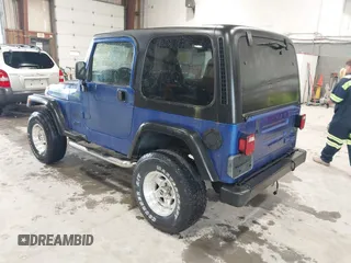 1998 Jeep Wrangler SE with VIN 1J4FY29PXWP769503, listed as a IAAI auction lot 42535360 with 94,634 mi miles and . Bid and sale history available at DreamBid. Image 3.