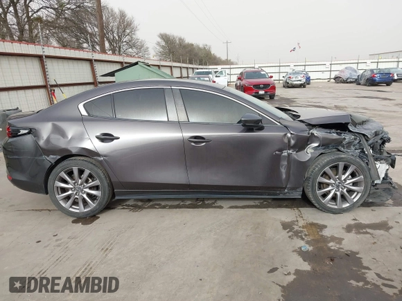 2019 Mazda 3 Select with VIN 3MZBPAAL0KM105508, listed as a IAAI auction lot 41684697 with 88,751 mi miles and . Bid and sale history available at DreamBid. Image 6.