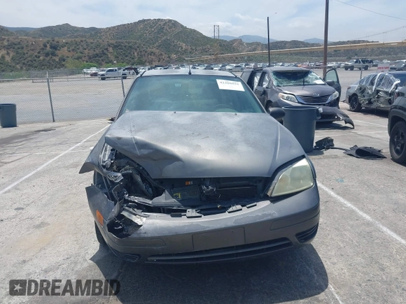 2007 Ford Focus S z VIN 1FAFP34N17W123378, wystawiony jako IAAI lot #42208033 z przebiegiem 183 803 mil mil oraz . Historia ofert i sprzedaży dostępna na DreamBid. Obrazek 13.