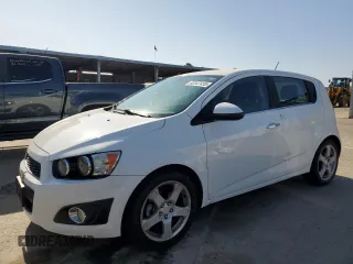 2016 Chevrolet Sonic LTZ z VIN 1G1JE6SB0G4155098, wystawiony jako Copart lot #62547455 z przebiegiem 85 604 mil mil oraz Czysty tytuł • Clean title. Historia ofert i sprzedaży dostępna na DreamBid. Obrazek 1.