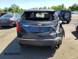 2018 Cadillac XT5 AWD with VIN 1GYKNBRS8JZ203963, listed as a Copart auction lot 57243165 with 18,407 mi miles and Salvage title. Bid and sale history available at DreamBid. Image 6.