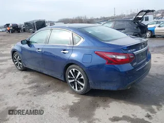 2018 Nissan Altima 2.5 SR with VIN 1N4AL3AP3JC101421, listed as a IAAI auction lot 41482620 with 101,431 mi miles. Bid and sale history available at carsss.com. Image 3.