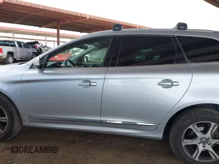 2015 Volvo XC60 T6 Platinum с VIN YV4902RMXF2719971, выставлен на аукционе IAAI как лот 41970301 с пробегом 63 399 миль миль и . История ставок и продаж доступна на DreamBid. Изображение 14.