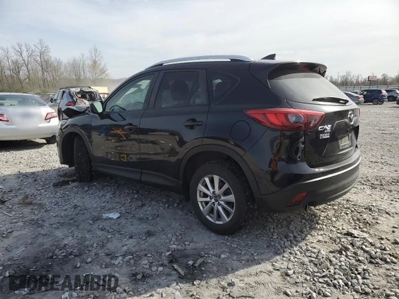 2016 Mazda CX-5 Touring z VIN JM3KE4CY0G0667171, wystawiony jako Copart lot #51579005 z przebiegiem 39 487 mil mil oraz Szkoda całkowita • Salvage title. Historia ofert i sprzedaży dostępna na DreamBid. Obrazek 2.
