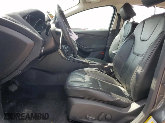 2016 Ford Focus Titanium with VIN 1FADP3N27GL201482, listed as a Copart auction lot 51768335 with 54,463 mi miles and Salvage title. Bid and sale history available at DreamBid. Image 7.