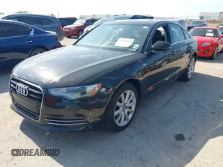 2014 Audi A6 Premium Plus with VIN WAUFGAFC8EN031369, listed as a IAAI auction lot 42245643 with Not provided miles and . Bid and sale history available at DreamBid. Image 2.