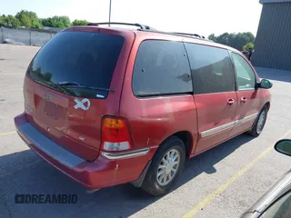 1999 Ford Windstar SE z VIN 2FMZA5242XBB02440, wystawiony jako IAAI lot #42506624 z przebiegiem 157 395 mil mil oraz . Historia ofert i sprzedaży dostępna na DreamBid. Obrazek 4.