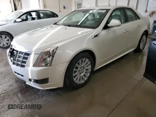 2012 Cadillac CTS Luxury with VIN 1G6DG5E57C0125969, listed as a Copart auction lot 49002865 with 105,800 mi miles and Salvage Title. Bid and sale history available at DreamBid. Image 1.