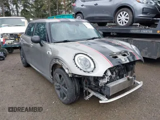 2017 MINI Hardtop 4 Door Cooper S z VIN WMWXU3C58H2D33073, wystawiony jako IAAI lot #41913081 z przebiegiem 51 631 mil mil oraz . Historia ofert i sprzedaży dostępna na DreamBid. Obrazek 1.