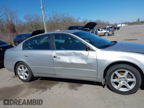 2003 Nissan Altima S with VIN 1N4AL11D63C321486, listed as a IAAI auction lot 41581386 with 200,082 mi miles. Bid and sale history available at carsss.com. Image 13.
