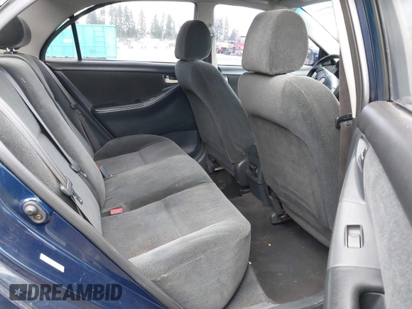2003 Toyota Corolla CE with VIN 1NXBR32E83Z084375, listed as a IAAI auction lot 41915211 with 299,999 mi miles and . Bid and sale history available at DreamBid. Image 8.