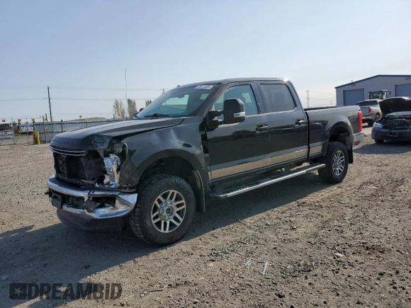 2017 Ford F-250 Lariat with VIN 1FT7W2B6XHEE59786, listed as a Copart auction lot 59812305 with 67,630 mi miles and Salvage title. Bid and sale history available at DreamBid. Image 1.