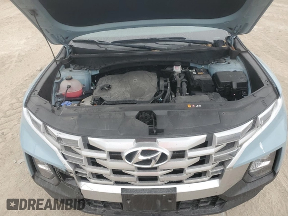 2023 Hyundai Santa Cruz SEL z VIN 5NTJC4AE4PH043025, wystawiony jako Copart lot #41617645 z przebiegiem Nie podano mil oraz Nie do naprawy • Non repairable. Historia ofert i sprzedaży dostępna na DreamBid. Obrazek 13.