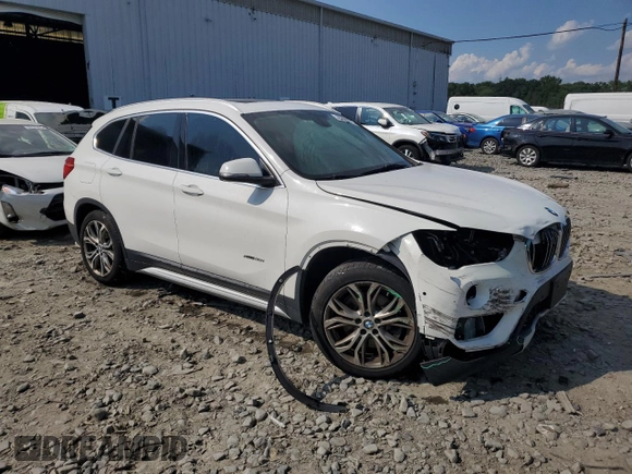 2017 BMW X1 xDrive28i z VIN WBXHT3C35H5F86099, wystawiony jako Copart lot #60196275 z przebiegiem 61 117 mil mil oraz Szkoda całkowita • Salvage title. Historia ofert i sprzedaży dostępna na DreamBid. Obrazek 4.