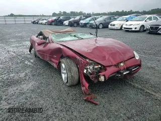 1999 Jaguar XK with VIN SAJGX204XXC038435, listed as a Copart auction lot 64843714 with Not Provided miles and Salvage Title. Bid and sale history available at DreamBid. Image 11.