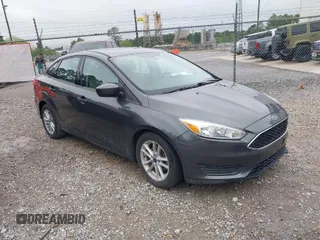2018 Ford Focus SE with VIN 1FADP3FE9JL275194, listed as a IAAI auction lot 41979690 with 95,383 mi miles. Bid and sale history available at carsss.com. Image 1.