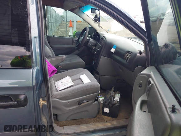 2006 Dodge Grand Caravan SE with VIN 1D4GP24R36B605743, listed as a IAAI auction lot 42068947 with 324,595 mi miles and . Bid and sale history available at DreamBid. Image 5.