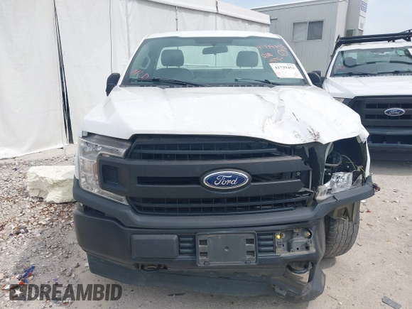 2018 Ford F-150 XL with VIN 1FTMF1EB2JKE86171, listed as a IAAI auction lot 41739453 with 119,296 mi miles and . Bid and sale history available at DreamBid. Image 12.