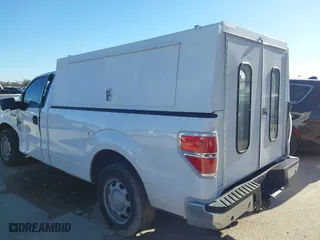 2014 Ford F-150 XL with VIN 1FTMF1CM0EKG22856, listed as a IAAI auction lot 41677979 with 158,580 mi miles. Bid and sale history available at carsss.com. Image 3.