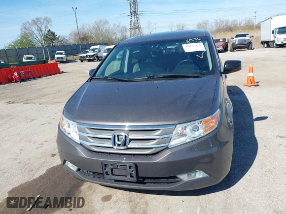 2012 Honda Odyssey Touring with VIN 5FNRL5H9XCB077351, listed as a IAAI auction lot 42045976 with 146,290 mi miles and . Bid and sale history available at DreamBid. Image 12.