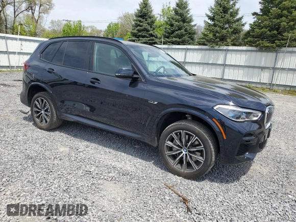 2023 BMW X5 xDrive45e z VIN 5UXTA6C01P9R61137, wystawiony jako Copart lot #56458155 z przebiegiem 27 501 mil mil oraz Szkoda całkowita • Salvage title. Historia ofert i sprzedaży dostępna na DreamBid. Obrazek 4.