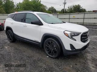2021 GMC Terrain SLE with VIN 3GKALTEV5ML386042, listed as a Copart auction lot 56867875 with 63,859 mi miles and Salvage title. Bid and sale history available at DreamBid. Image 4.