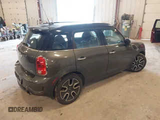 2011 MINI Countryman S z VIN WMWZC3C54BWL78942, wystawiony jako IAAI lot #42345296 z przebiegiem 158 202 mil mil oraz . Historia ofert i sprzedaży dostępna na DreamBid. Obrazek 4.