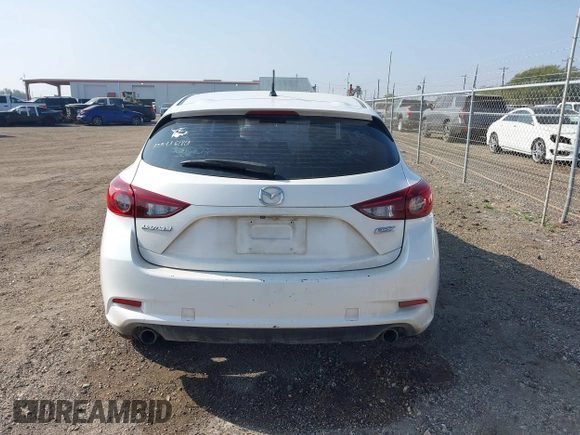 2017 Mazda 3 Touring with VIN 3MZBN1L77HM157118, listed as a IAAI auction lot 41734627 with 132,452 mi miles and . Bid and sale history available at DreamBid. Image 16.