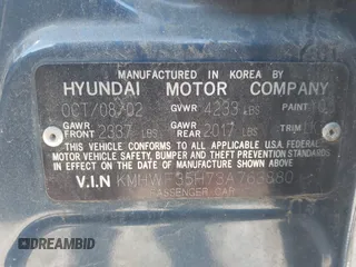 2003 Hyundai Sonata GLS with VIN KMHWF35H73A763880, listed as a IAAI auction lot 41563764 with 123,058 mi miles. Bid and sale history available at carsss.com. Image 9.