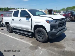 2023 Chevrolet Colorado 2WD Work Truck z VIN 1GCGSBEC3P1133430, wystawiony jako IAAI lot #42001554 z przebiegiem 26 572 mil mil oraz . Historia ofert i sprzedaży dostępna na DreamBid. Obrazek 1.