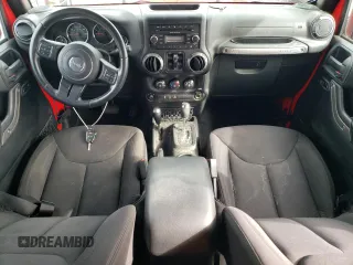 2015 Jeep Wrangler Unlimited Willys Wheeler with VIN 1C4BJWDG2FL542045, listed as a Copart auction lot 52903465 with 86,205 mi miles and Clean Title. Bid and sale history available at DreamBid. Image 8.