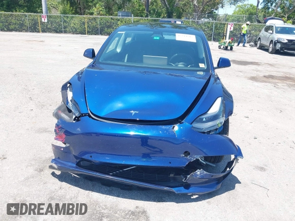 2022 Tesla Model 3 Long Range z VIN 5YJ3E1EB6NF106038, wystawiony jako IAAI lot #42214585 z przebiegiem 40 667 mil mil oraz . Historia ofert i sprzedaży dostępna na DreamBid. Obrazek 12.