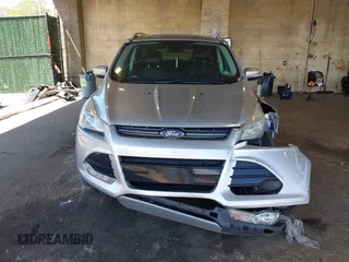 2016 Ford Escape Titanium с VIN 1FMCU9JX3GUB75889, выставлен на аукционе IAAI как лот 42188565 с пробегом 121 638 миль миль и . История ставок и продаж доступна на DreamBid. Изображение 12.