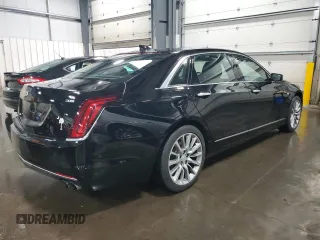 2018 Cadillac CT6 Luxury AWD z VIN 1G6KD5RSXJU102871, wystawiony jako Copart lot #54579165 z przebiegiem 31 219 mil mil oraz Szkody całkowita. Historia ofert i sprzedaży dostępna na DreamBid. Obrazek 3.