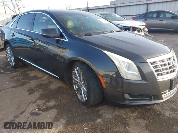 2013 Cadillac XTS with VIN 2G61N5S34D9231315, listed as a IAAI auction lot 41092660 with 206,093 mi miles. Bid and sale history available at carsss.com. Image 1.