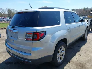 2013 GMC Acadia SLE with VIN 1GKKRNED1DJ157161, listed as a IAAI auction lot 41883907 with 156,020 mi miles. Bid and sale history available at carsss.com. Image 4.