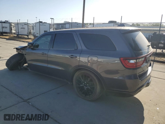 2016 Dodge Durango R/T with VIN 1C4SDJCT5GC371916, listed as a Copart auction lot 59390725 with 133,863 mi miles and Salvage title. Bid and sale history available at DreamBid. Image 2.