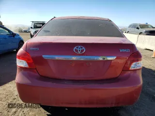2012 Toyota Yaris with VIN JTDBT4K37C1419301, listed as a Copart auction lot 46705025 with 201,884 mi miles and Salvage Title. Bid and sale history available at DreamBid. Image 6.