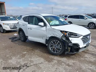 2021 Hyundai Tucson Limited with VIN KM8J33AL5MU410311, listed as a IAAI auction lot 41395702 with 55,562 mi miles. Bid and sale history available at carsss.com. Image 1.