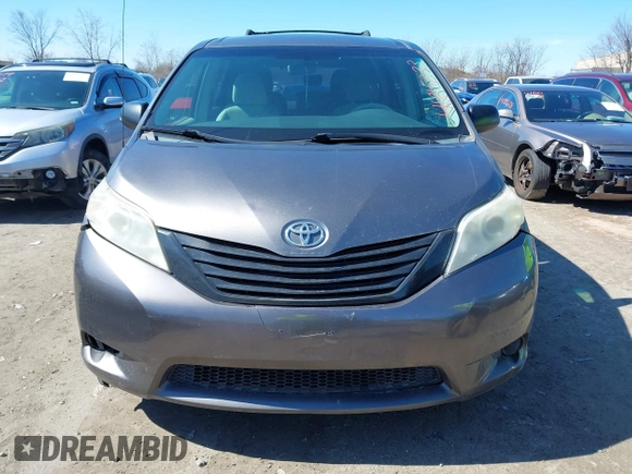 2011 Toyota Sienna with VIN 5TDZK3DC6BS125737, listed as a IAAI auction lot 41815233 with 248,318 mi miles. Bid and sale history available at carsss.com. Image 12.