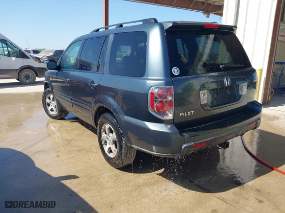 2006 Honda Pilot EX-L with VIN 5FNYF28556B003516, listed as a IAAI auction lot 42013495 with 207,443 mi miles. Bid and sale history available at carsss.com. Image 3.