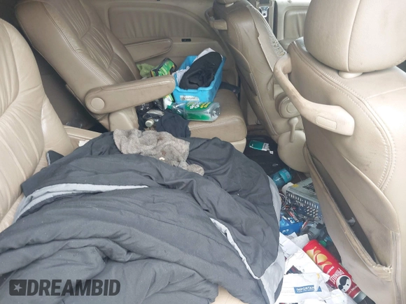 2008 Honda Odyssey EX-L with VIN 5FNRL38758B114588, listed as a IAAI auction lot 42101377 with 306,345 mi miles and . Bid and sale history available at DreamBid. Image 8.