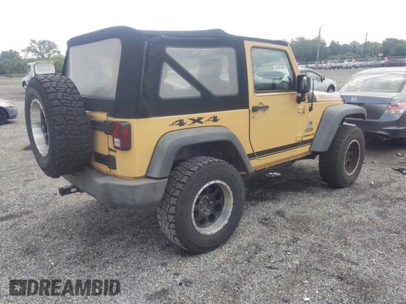 2013 Jeep Wrangler Sport with VIN 1C4AJWAG1DL672816, listed as a IAAI auction lot 42597238 with 105,910 mi miles and . Bid and sale history available at DreamBid. Image 4.