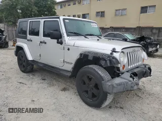 2010 Jeep Wrangler Unlimited Sahara with VIN 1J4BA5H17AL117410, listed as a Copart auction lot 88519555 with 126,471 mi miles and Salvage Title. Bid and sale history available at carsss.com. Image 4.