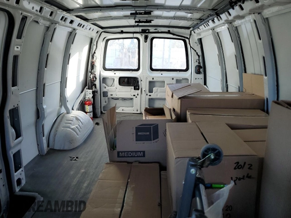 2021 Chevrolet Express Cargo with VIN 1GCWGBFP6M1268993, listed as a Copart auction lot 79764904 with 66,600 mi miles and Salvage title. Bid and sale history available at DreamBid. Image 10.