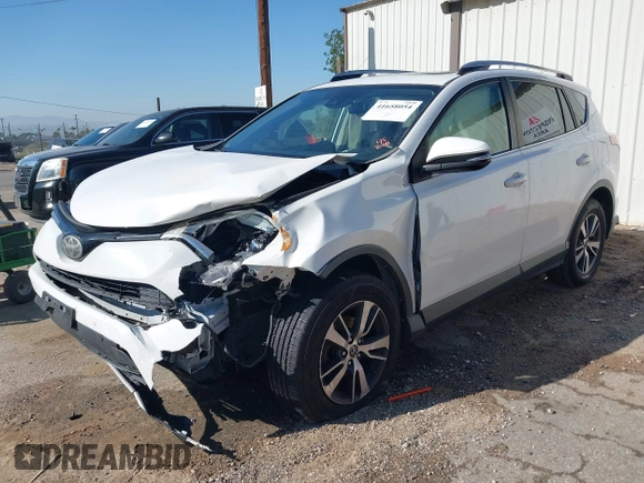 2017 Toyota RAV4 XLE with VIN JTMWFREV9HJ128521, listed as a IAAI auction lot 41658054 with 106,788 mi miles and . Bid and sale history available at DreamBid. Image 18.