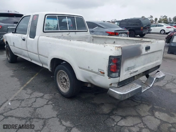 1992 Toyota 2WD Pickups DLX with VIN JT4RN93P9N5064411, listed as a IAAI auction lot 41787535 with 170,294 mi miles. Bid and sale history available at carsss.com. Image 3.